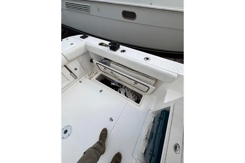 Slide: The Image of Interior view of 2010 Boston Whaler 345 Conquest boat cockpit with controls and seating. - 23