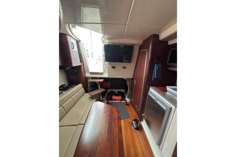 Slide: The Image of Interior cabin of 2010 Boston Whaler 345 Conquest with bed and storage. - 41