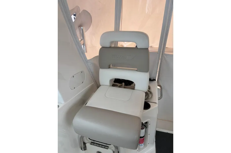 Slide: The Image of 2010 Boston Whaler 345 Conquest interior kitchen with modern appliances and wood cabinetry. - 47