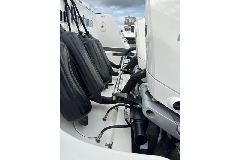 Slide: The Image of 2010 Boston Whaler 345 Conquest bow view with railing and anchor. - 9