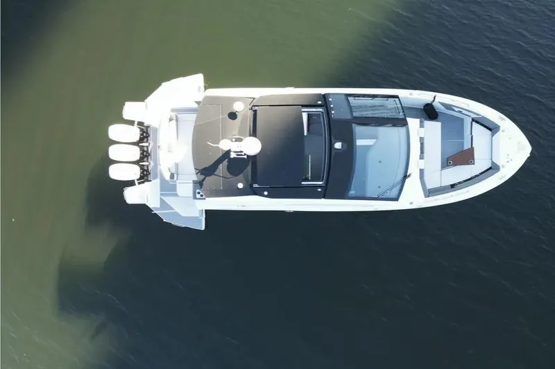 Slide: The Image of Aerial view of 2021 Cruisers Yachts 42 GLS OB on water. - 10