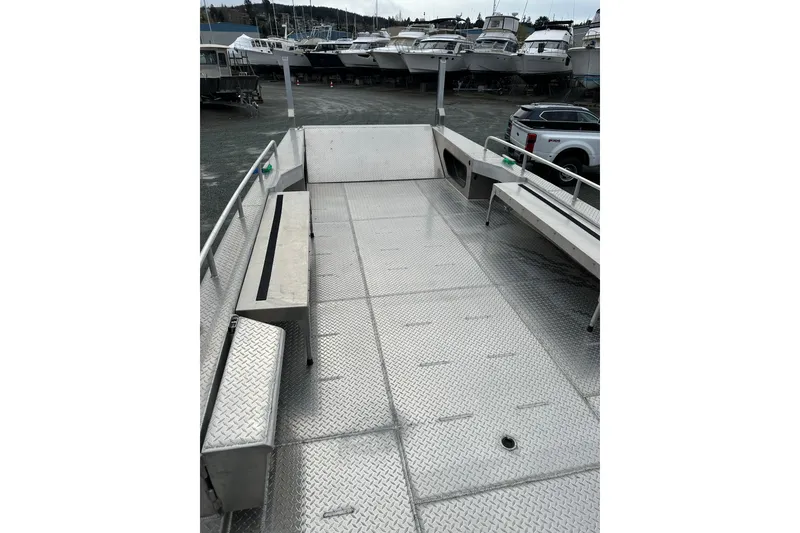 Slide: The Image of Bayview Boats 2026 model 30 Landing Craft with spacious deck and seating area. - 14