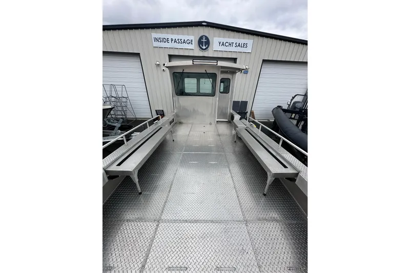 Slide: The Image of Bayview Boats 2026 model 30 Landing Craft at yacht sales facility. - 17