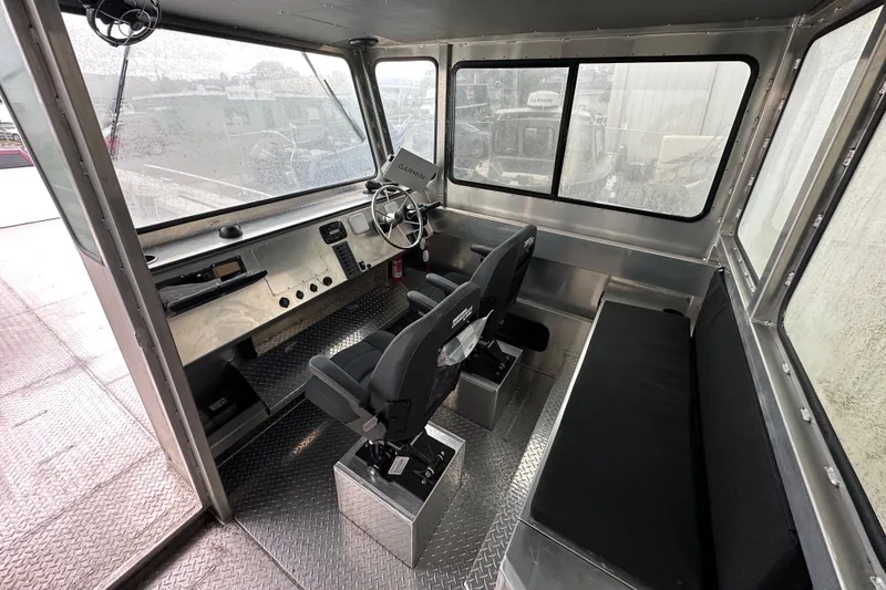 Slide: The Image of Interior of 2026 Bayview Boats 30 Landing Craft, featuring helm and seating area. - 5