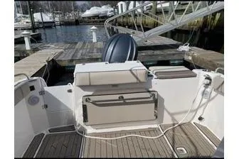 Slide: The Image of Rear view of a 2022 Cutwater C-24 Coupe boat in harbor. - 14