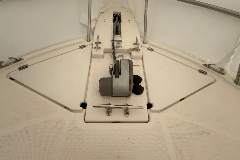 Slide: The Image of 2022 Cutwater C-24 Coupe boat deck with anchor winch system. - 23