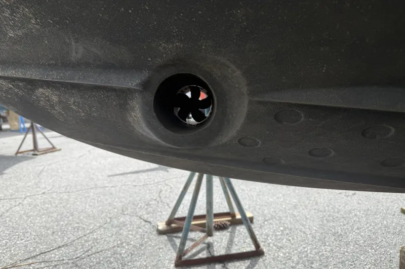 Slide: The Image of Close-up of 2022 Cutwater C-24 Coupe hull detail on a stand. - 64