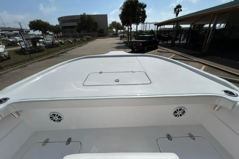 Slide: The Image of Shallow Stalker The Boss 2026 boat deck, parked outdoors under clear sky. - 15