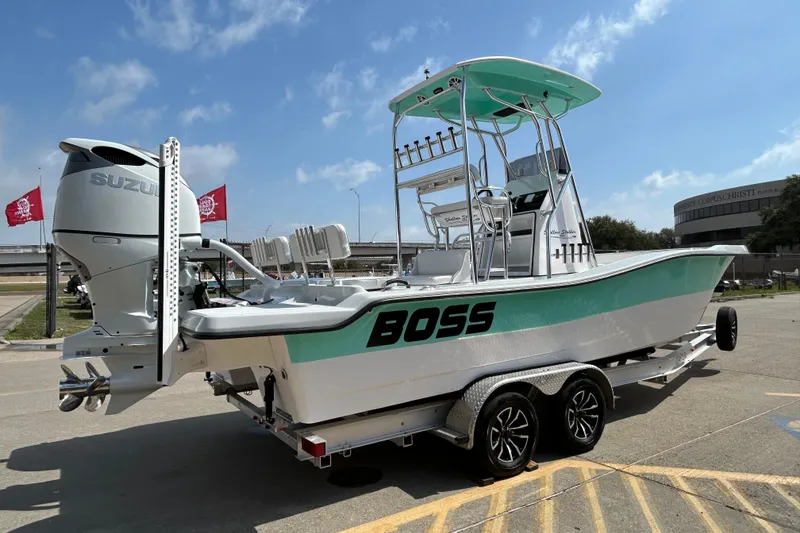Slide: The Image of 2026 Shallow Stalker "The Boss" boat with Suzuki engine on a trailer. - 5
