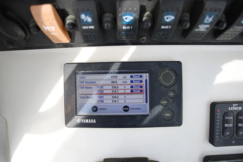 Slide: The Image of Yamaha display on 2018 Sea Hunt Gamefish 25 showing trip data and engine hours. - 14