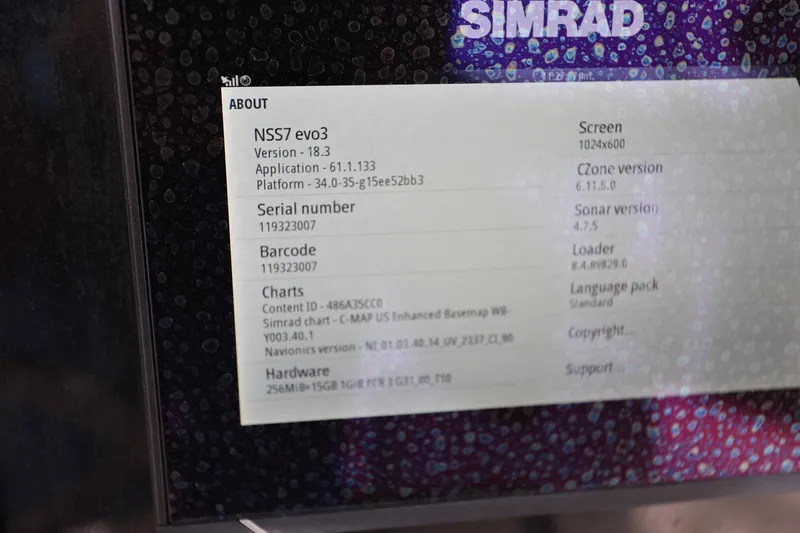 Slide: The Image of Simrad NSS7 evo3 display on 2018 Sea Hunt Gamefish 25, showing system information and specifications. - 17