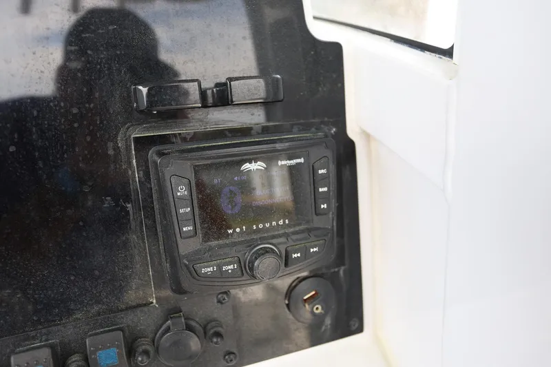 Slide: The Image of 2018 Sea Hunt Gamefish 25 dashboard with Wet Sounds audio system. - 18