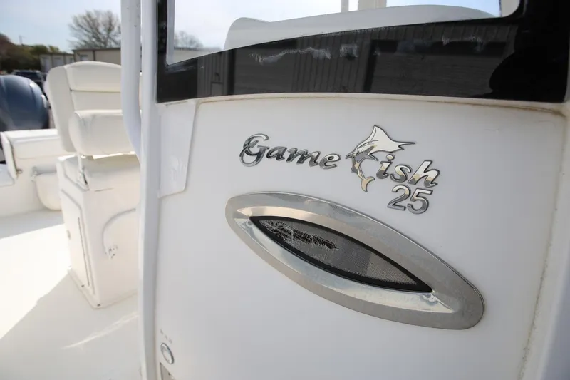 Slide: The Image of 2018 Sea Hunt Gamefish 25 boat interior with logo detail. - 28