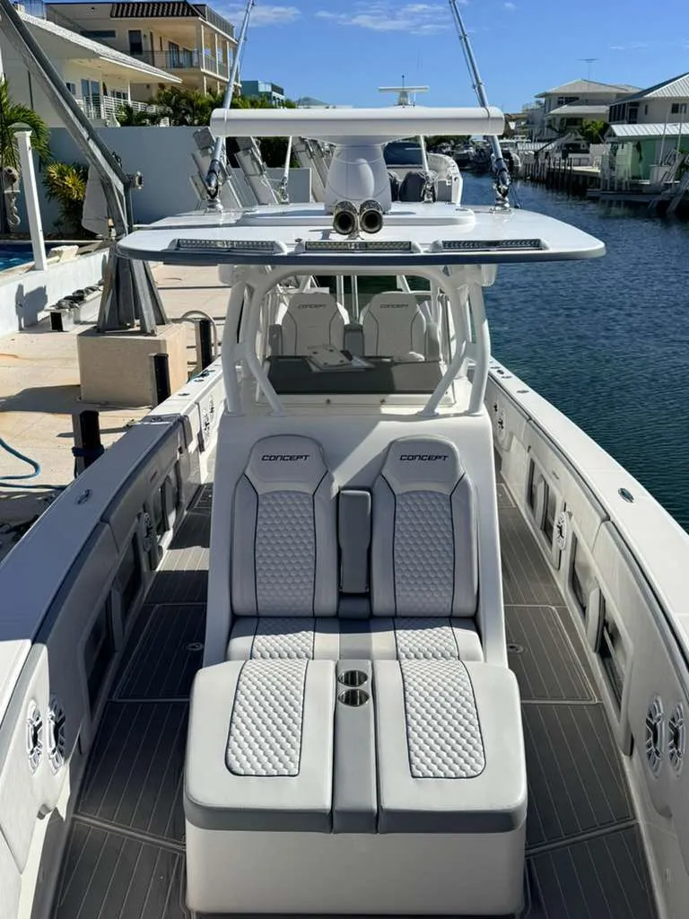 Slide: The Image of 2023 Concept 39' Open boat with luxurious interior at dock. - 11