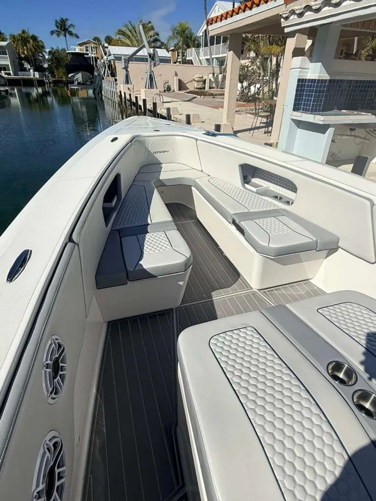 Slide: The Image of Interior of Concept 39' Open boat, 2023 model, featuring gray upholstery. - 13