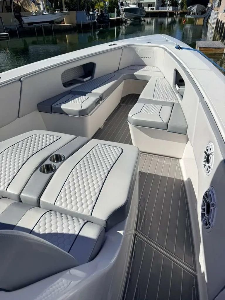 Slide: The Image of Interior view of 2023 Concept 39' Open boat with gray upholstery. - 15