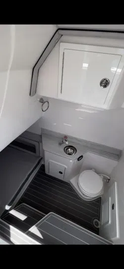 Slide: The Image of Interior of Concept 39' Open 2023 with toilet and sink. - 26