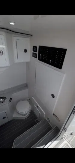 Slide: The Image of Interior of 2023 Concept 39' Open boat with toilet and control panel. - 27
