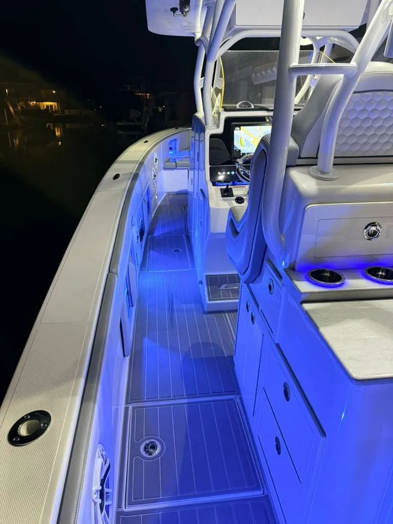Slide: The Image of Interior view of 2023 Concept 39' Open boat with night lighting. - 30