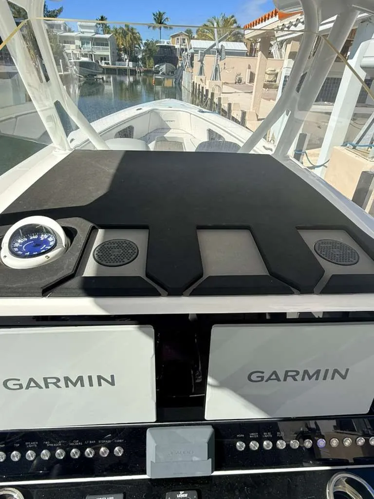 Slide: The Image of Interior view of 2023 Concept 39' Open boat with Garmin displays. - 6