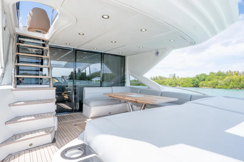 Slide: The Image of Luxurious Sunseeker 68 Sport Yacht 2014 with spacious deck and elegant seating area. - 16