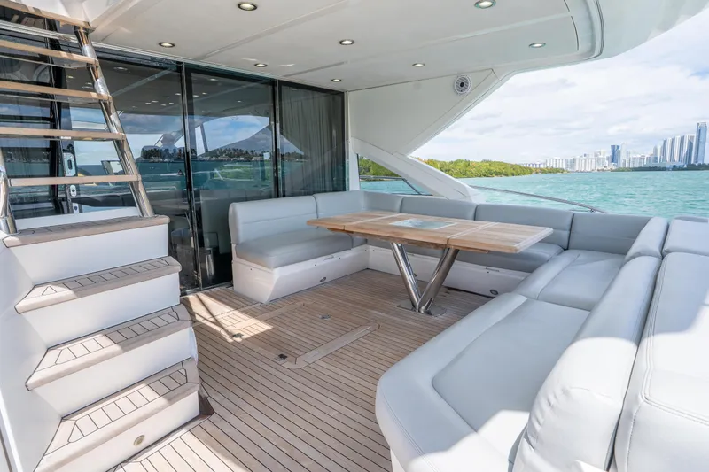 Slide: The Image of Luxurious Sunseeker 68 Sport Yacht 2014 with spacious deck and elegant seating area. - 17