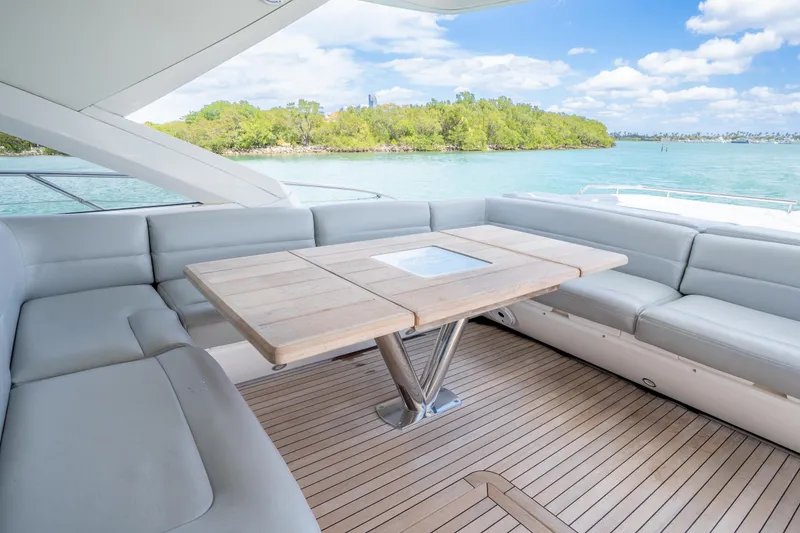 Slide: The Image of Luxurious Sunseeker 68 Sport Yacht 2014 with elegant deck seating and scenic ocean view. - 18