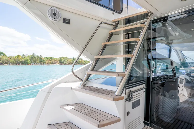 Slide: The Image of Staircase on 2014 Sunseeker 68 Sport Yacht with ocean view in background. - 22
