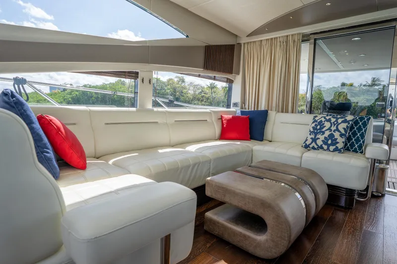 Slide: The Image of Luxurious interior of 2014 Sunseeker 68 Sport Yacht with elegant seating and vibrant cushions. - 23