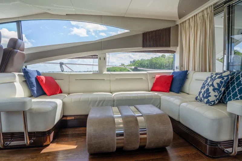 Slide: The Image of Luxurious interior of 2014 Sunseeker 68 Sport Yacht with elegant seating and vibrant cushions. - 24