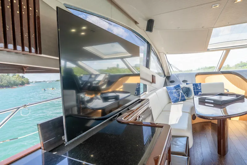 Slide: The Image of Luxurious interior of 2014 Sunseeker 68 Sport Yacht with plush seating and scenic views. - 27