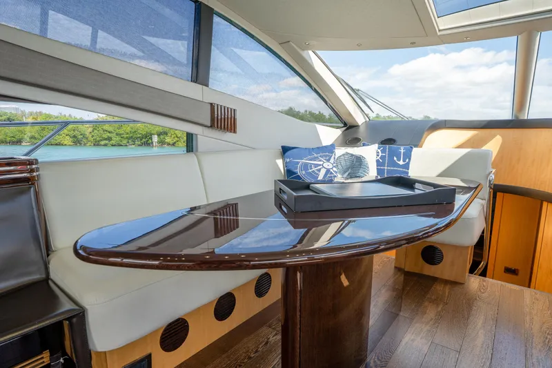 Slide: The Image of Luxurious interior of 2014 Sunseeker 68 Sport Yacht with elegant seating and nautical decor. - 28