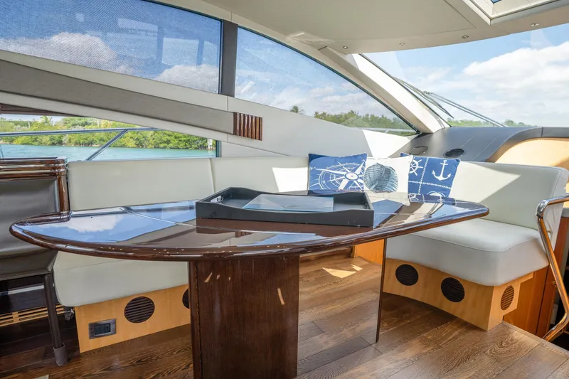 Slide: The Image of Luxurious interior of 2014 Sunseeker 68 Sport Yacht with elegant seating and nautical decor. - 29