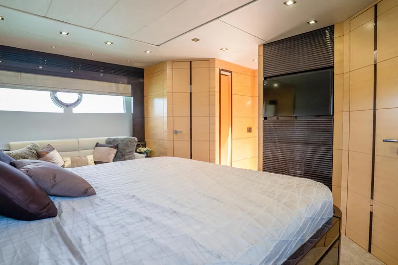 Slide: The Image of Luxurious bedroom interior of 2014 Sunseeker 68 Sport Yacht with modern design and cozy seating. - 38