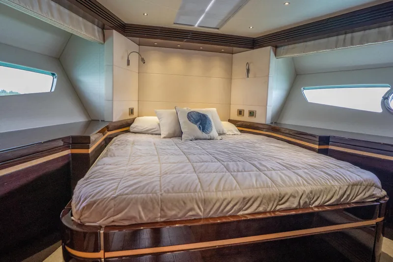 Slide: The Image of Luxurious bedroom interior of 2014 Sunseeker 68 Sport Yacht with elegant bedding and modern design. - 44
