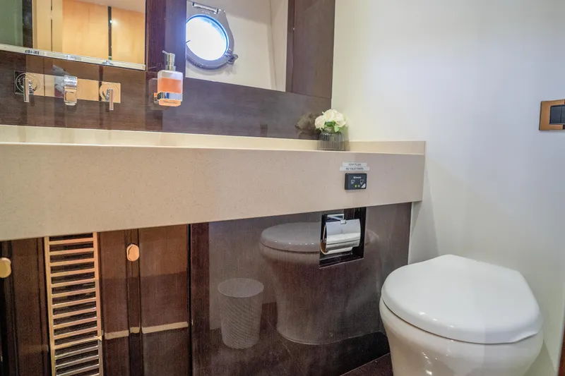 Slide: The Image of Luxurious bathroom in 2014 Sunseeker 68 Sport Yacht with modern fixtures and elegant design. - 45