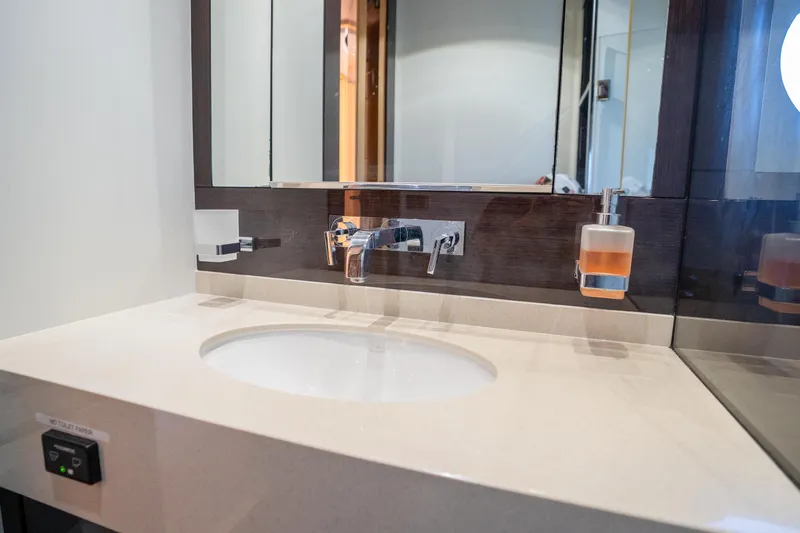 Slide: The Image of Luxurious bathroom sink area in a 2014 Sunseeker 68 Sport Yacht. - 46