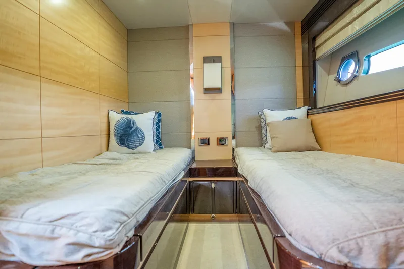 Slide: The Image of Luxurious twin cabin interior of 2014 Sunseeker 68 Sport Yacht with elegant wood paneling. - 47