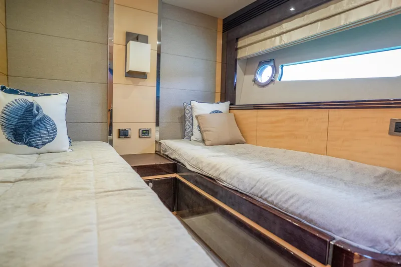 Slide: The Image of Interior cabin of 2014 Sunseeker 68 Sport Yacht with twin beds and nautical decor. - 48