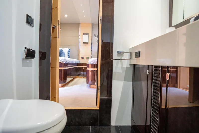 Slide: The Image of Luxurious bathroom interior of 2014 Sunseeker 68 Sport Yacht, featuring modern fixtures and elegant design. - 50