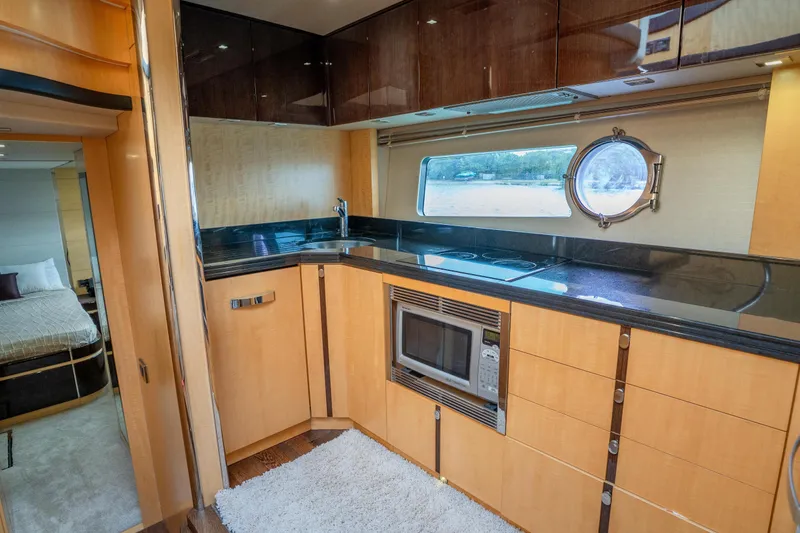 Slide: The Image of Luxurious kitchen interior of 2014 Sunseeker 68 Sport Yacht with modern amenities. - 52