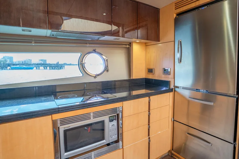 Slide: The Image of Luxurious kitchen interior of 2014 Sunseeker 68 Sport Yacht with modern appliances and ocean view. - 54