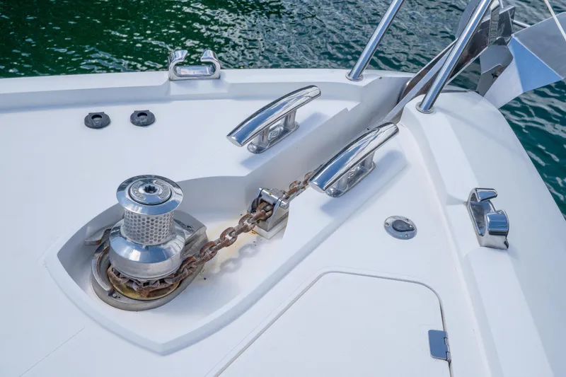 Slide: The Image of Anchor system on 2014 Sunseeker 68 Sport Yacht, featuring polished metal fittings. - 59