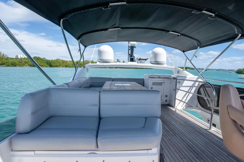 Slide: The Image of Luxurious Sunseeker 68 Sport Yacht 2014 with spacious deck and seating, cruising on turquoise waters. - 66