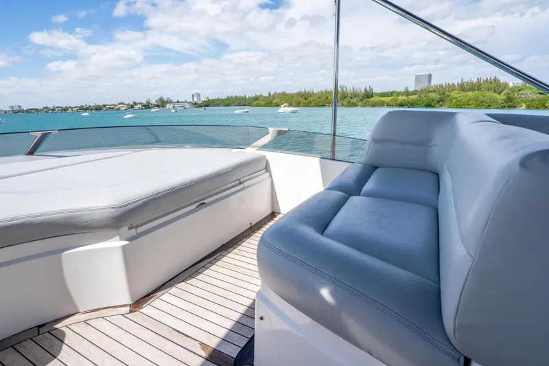 Slide: The Image of Luxurious seating on 2014 Sunseeker 68 Sport Yacht with scenic ocean view. - 67
