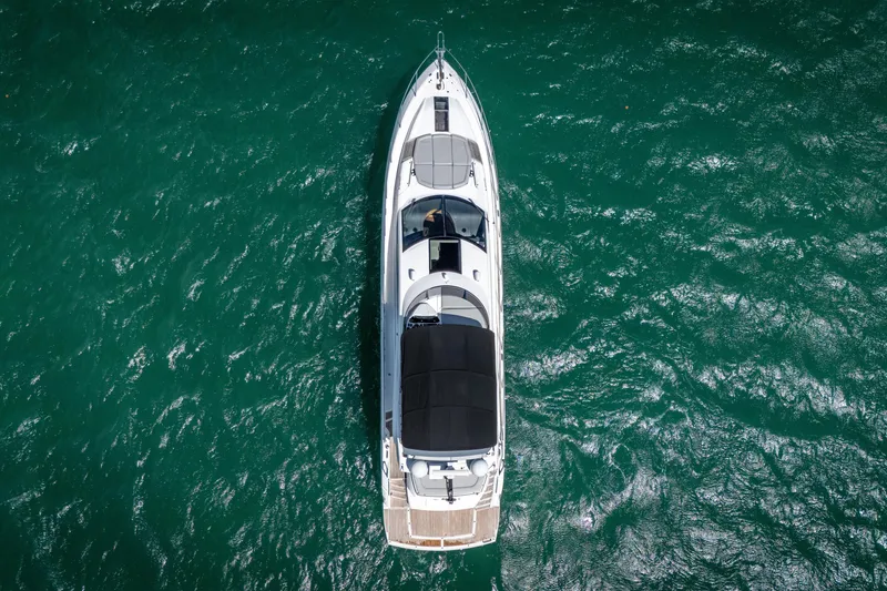 Slide: The Image of Aerial view of 2014 Sunseeker 68 Sport Yacht on turquoise water. - 7