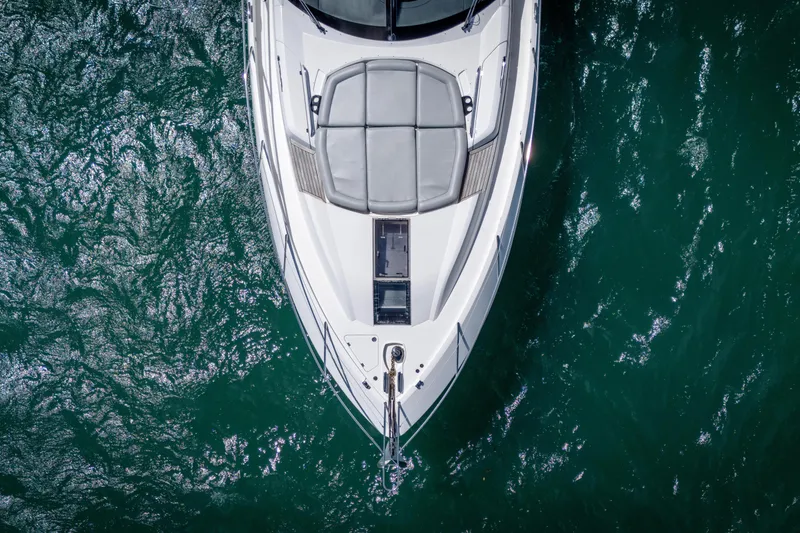 Slide: The Image of Aerial view of 2014 Sunseeker 68 Sport Yacht on vibrant blue water. - 9