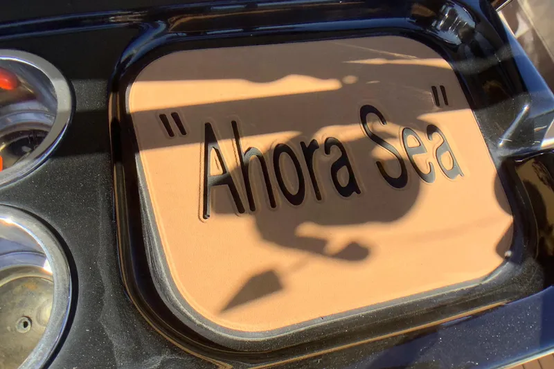 Slide: The Image of "Ahora Sea" nameplate on 2018 Tidewater 2700 Carolina Bay boat. - 23