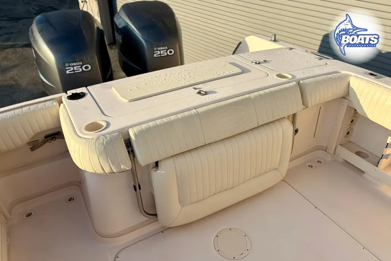 Slide: The Image of 2008 Grady-White Sailfish 282 boat with Yamaha 250 engines, featuring cushioned seating. - 16