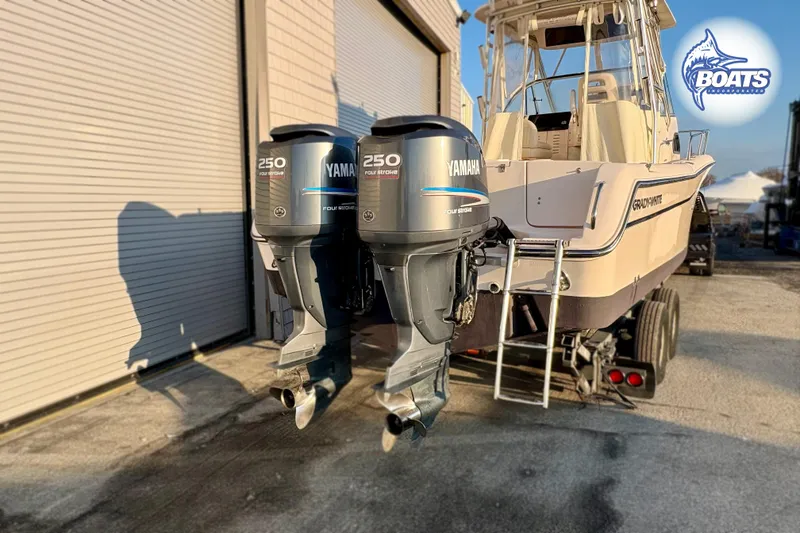 Slide: The Image of 2008 Grady-White Sailfish 282 boat with twin Yamaha 250 engines on a trailer. - 17